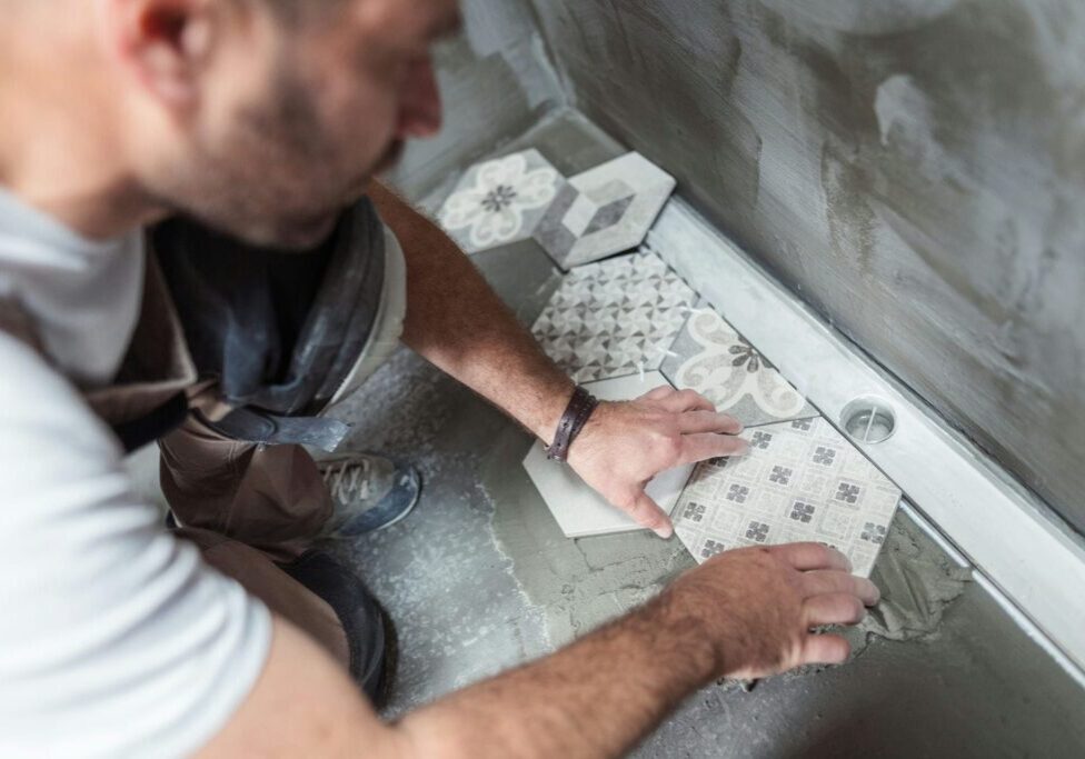 installing bathroom floor in Toronto condo renovation